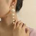 Cream pearl earrings , long pearl earrings , long cream earrings , cream bride earrings , white pearl earring