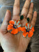 Enamel flower earrings , orange flower earrings ,long orange earrings , orange and green earrings