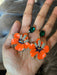 Enamel flower earrings , orange flower earrings ,long orange earrings , orange and green earrings