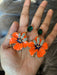 Enamel flower earrings , orange flower earrings ,long orange earrings , orange and green earrings